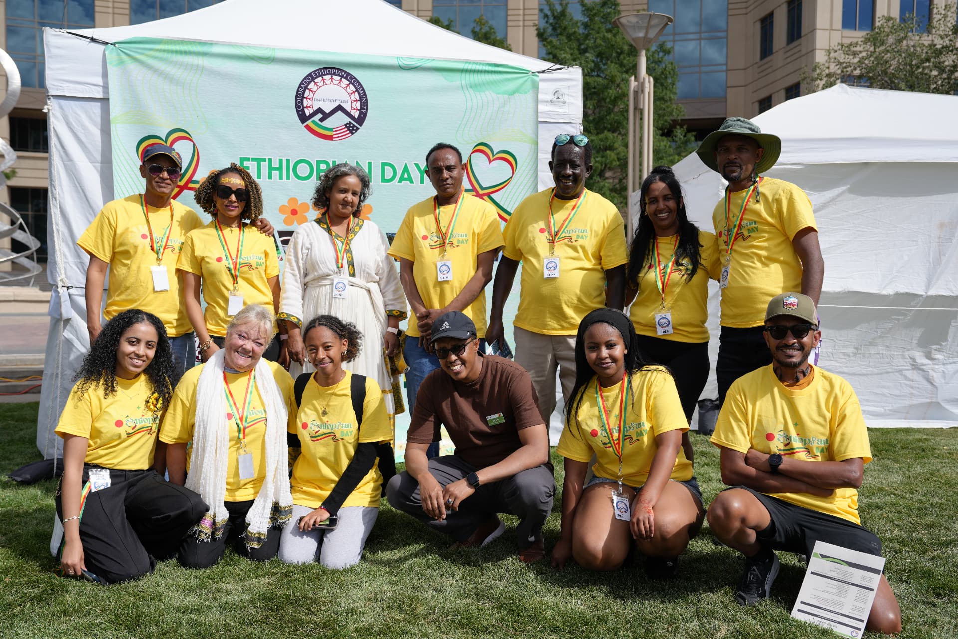 Colorado Ethiopian Community volunteers in yellow Ethiopian Day shirts